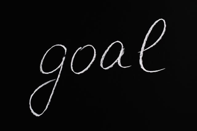 Word Goal on a black background.