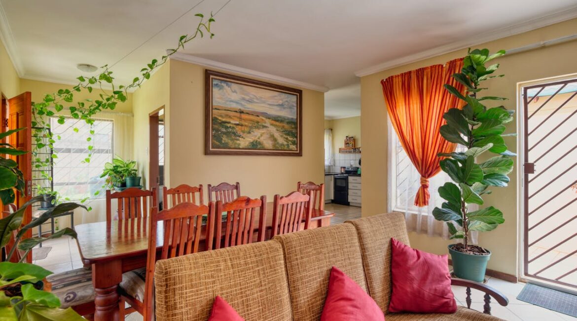 living room with a lot of plants